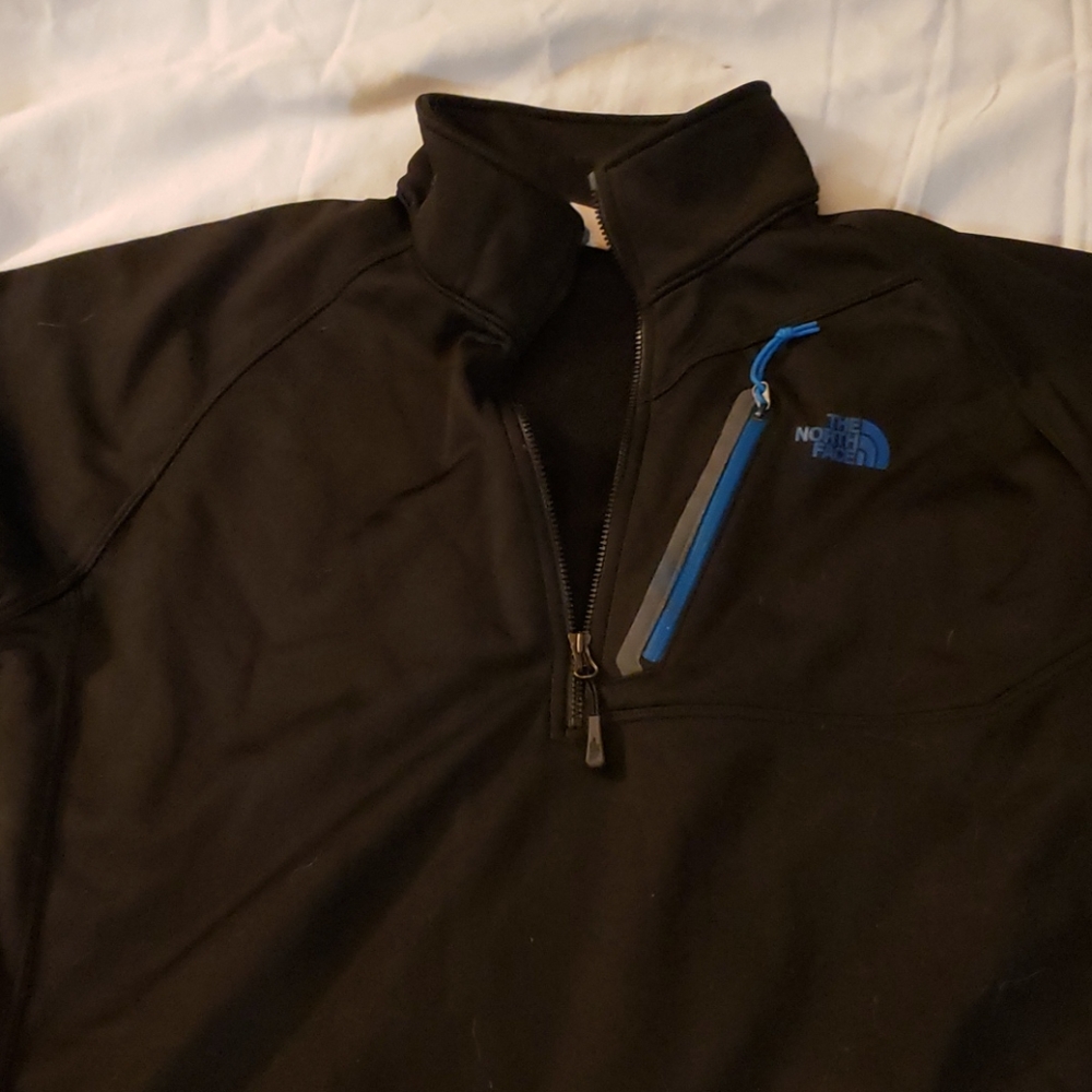Black, half zip North Face ski sweater